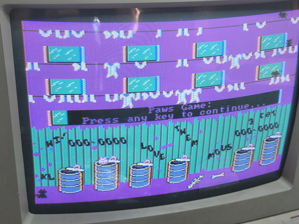 A photograph of the PC Booter game AlleyCat running in composite on a Commodore 1084D monitor